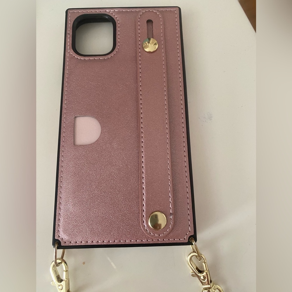 iPhone 11 pink case with medium length strap